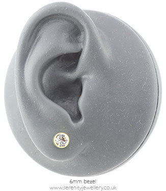 Blomdahl golden titanium crystal earrings