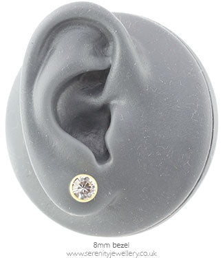 Blomdahl golden titanium crystal earrings