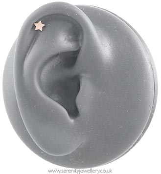 Small star cartilage earring