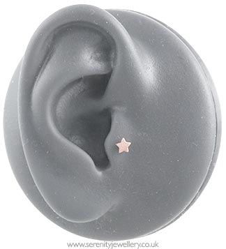 Small star cartilage earring