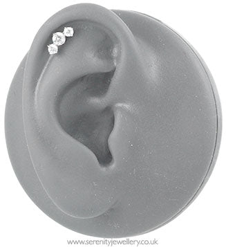 Prong-set three crystal cartilage earring